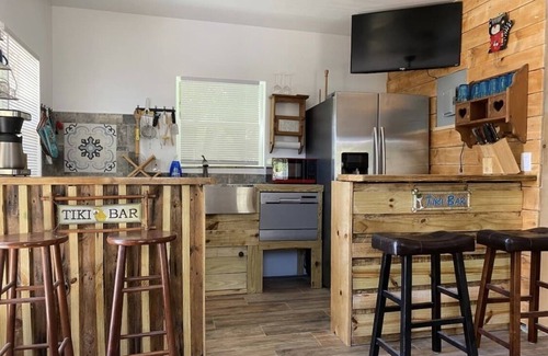Old Seminole Heights Cabaña | Hot tub, waterfront, Bush Gardens, kajaks, fishing