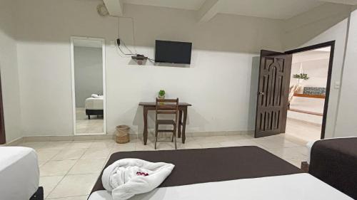 Centro Hotel | Hotel Balxibá alberca y estacionamiento