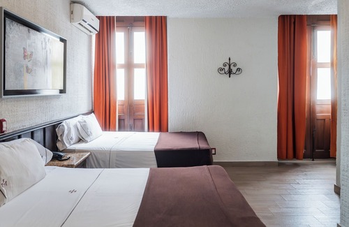Centro de Guadalajara Hotel | Hotel Don Quijote Plaza