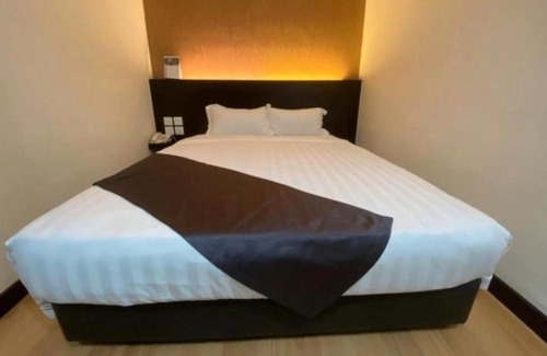Central District Hotel | Hotel EzzyHome Kebun Teh