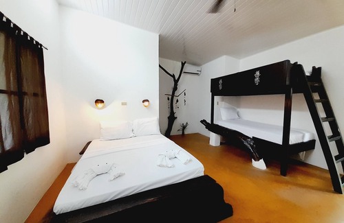 Lagartero Hotel | Hotel Hibiscus Garden / Jardin De Papos
