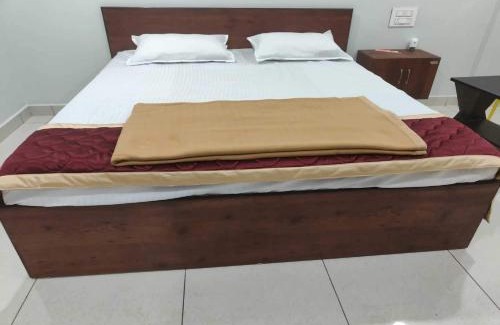 Nellore Hotel | Hotel O Mini Bypass Nellore Road Formerly AMR Guest Inn