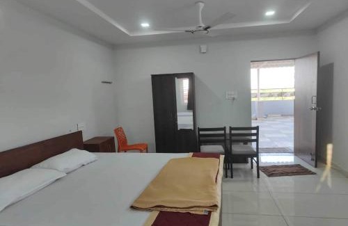 Nellore Hotel | Hotel O Mini Bypass Nellore Road Formerly AMR Guest Inn