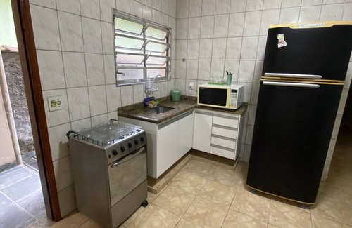 Real Casa | House 4 Suites, Large Space for Barbecue for 16 people.