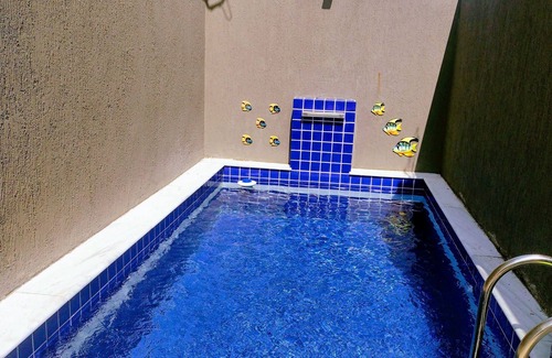Tupy Casa | House in a gated community in Itanhaém, swimming pool, garage, barbecue and Wi-Fi