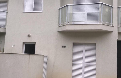 Pereque-Mirim Casa | Inicio en una urbanización cerrada con piscina, barbacoa y conexión wi-fi