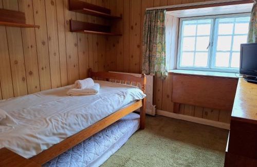 Dunster Apartamento | House in historic village - Sleeps 6