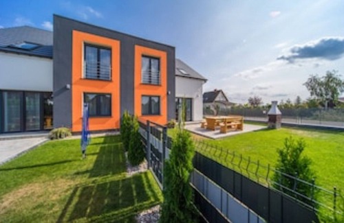gmina Wolin Casa | House KATAMARAN 4 Bedrooms Baltic Sea Sea view Garden Barbecue W-Lan Playground Fishing