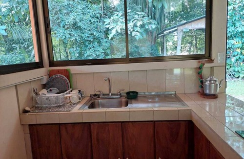 Pacuare Reserve Casa | Casa rodeada de naturaleza, ideal para descansar.