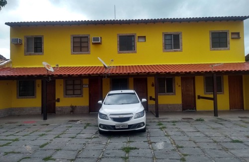 Sao Cristovao Casa | Casa con 2 dormitorios y 2 baños en un condominio, cerca de Praia do Forte.