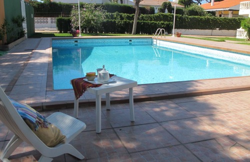 Punta Umbria Apartamento | Casa con jardín y piscina a pocos pasos del mar
