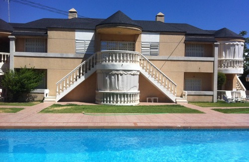 Punta Umbria Apartamento | Casa con jardín y piscina a pocos pasos del mar
