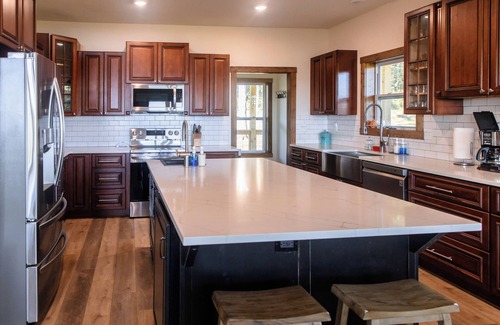 Kimberling City Casa | Huckleberry Hollow, secluded home in the woods, wraparound porch, soaker tub!