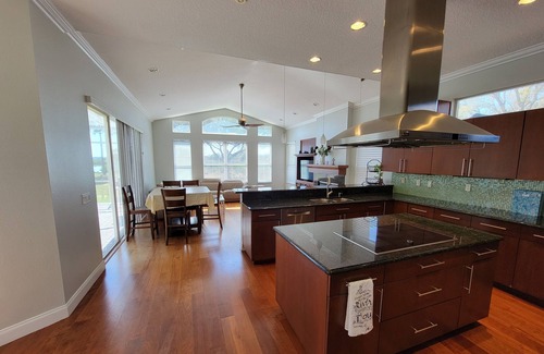 Tarpon Springs Casa | Huge Riverfront Home! Heated pool, Jacuzzi, and Kayaks Included!