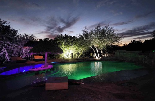 Pedernales Canyon Ranch Casa | Huge Updated RV that sleeps 8 in enchanting Spicewood. Pool, Hot tub, Steam room