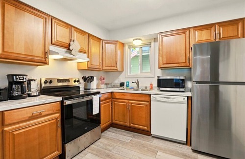 University Area Casa | Hugs In The Dusk - 2 Beds 1 Bath unit—one side of a duplex in Midtown Anchorage.