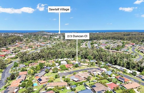 Boambee East Apartamento | Humble Abode, your perfect holiday home. This two bedroom townhouse is the ideal place to relax