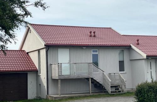 Klepp Apartamento | Hus med nydelig beliggenhet med egen inngang