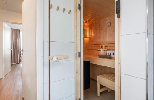 Marienleuchte Apartamento | Hygge – Familienfreundliche Ferienwohnung mit Garten & Meerblick