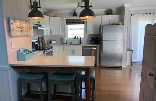 Avon Cabaña | HYPNAUTIC is a newly renovated sound front cottage