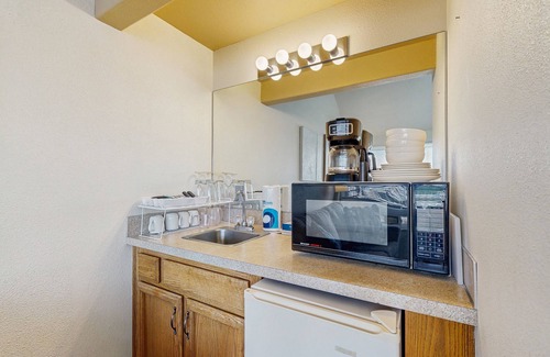 Historic Bayfront Condominio | Ideal getaway on the water with private balcony, cozy layout, and free WiFi