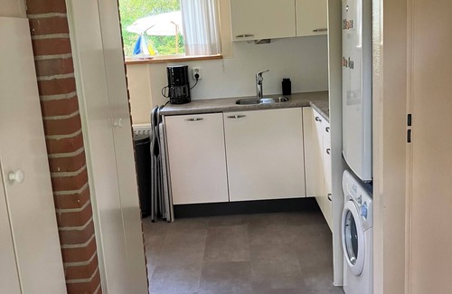 Zuideinde Cabaña | Idyllic house with spacious garden next to canal, boat rent is possible (extra)