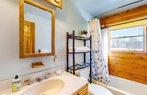 Meredith Casa | Idyllic lake retreat with beach access, firepit, wraparound porch, & great views