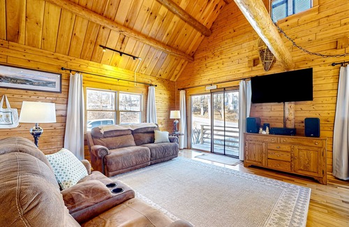 Meredith Casa | Idyllic lake retreat with beach access, firepit, wraparound porch, & great views
