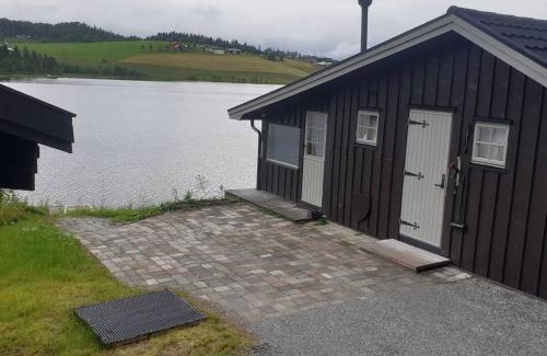 Orkdal Casa | Idyllic lakeside cabin with private beach and boat