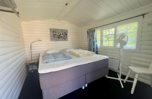 Osthammar Casa | Idylliskt hus med sjöutsikt.