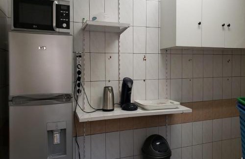 Lome Apartamento | iléos, appartement meublé 4 pièces - Salon, cuisine, 3 chambres Lomé Tokoin Hôpital Protestant