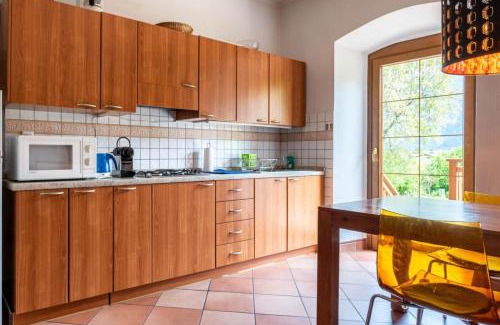 Caldonazzo Apartamento | Il Giardino ai Volti 2P, Caldonazzo Ospitar