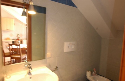 Tramonti Casa | Il Libeccio A3 Apartamento de 2 dormitorios con acceso al jardín y a la piscina.