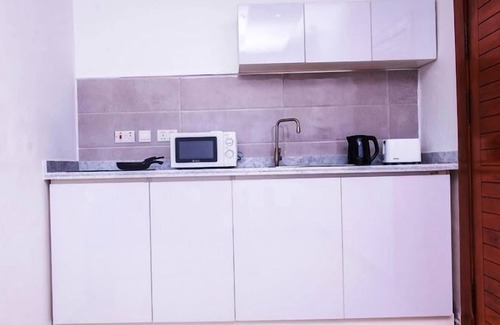 Okpanam Apartamento | Immaculate Hotel Apartment And Suites