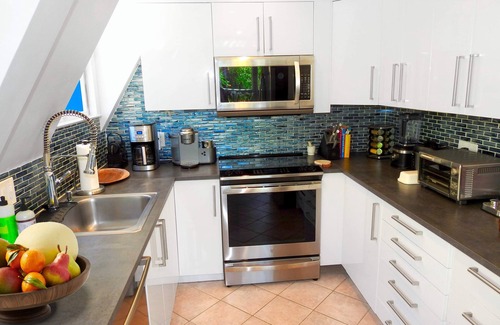 Fire Island Pines Casa | Hogar de lujo en Fire Island Pines cocina gourmet piscina jacuzzi privado