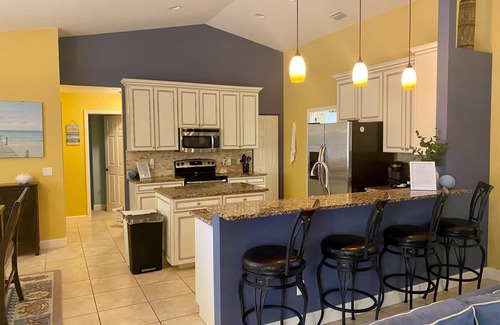 Broadmoor Casa | IMMACULATE well furnished home, heated pool, close to beaches! New paint!