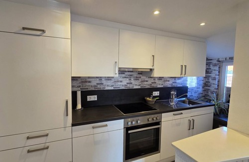 Dornumergrode Apartamento | In a quiet residential area + fenced garden + free WiFi + by the sea + dogs welcome + modern furnishings