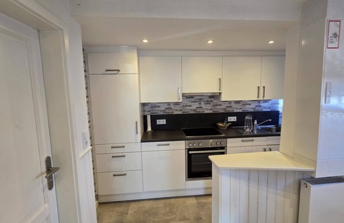 Dornumergrode Apartamento | In a quiet residential area + fenced garden + free WiFi + by the sea + dogs welcome + modern furnishings