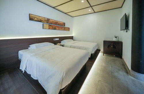 Xinzhou Cama Y Desayuno | In the Clouds - Courtyard Twin Room