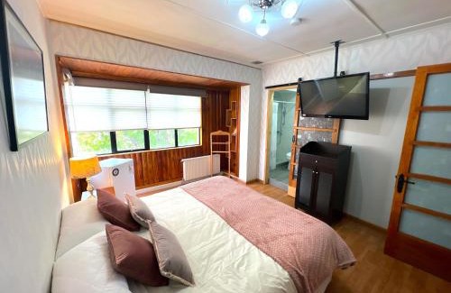 Punta Arenas Apartamento | Incredible Downtown Duplex with Interior Backyard