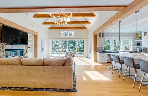 Plymouth Casa | Incredible home on lake with views, private beach, deck, AC, & W/D