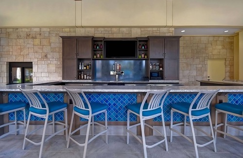 Florida Central Atlantic Coast Hotel | Indulge in Home Like Comfort! Full Kitchen, Outdoor Pool, Pets Allowed!