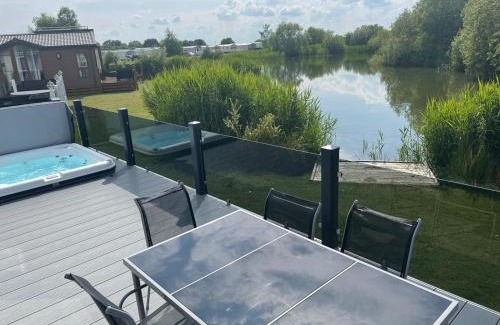 Tattershall Casa | Indulgence Lakeside Lodge i3 with hot tub, private fishing peg situated at Tattershall Lakes Country Park