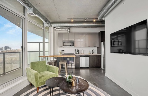 East Village Apartamento | Industrial 1BR w Office, Views, AC, XL Patio