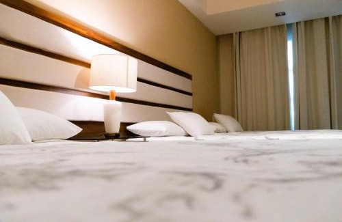 Alfredo V. Bonfil Apartamento | Infinity Suites habitación triple