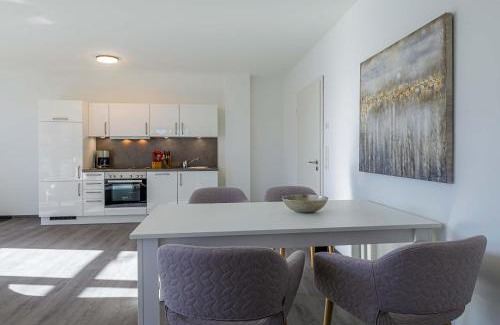 Krakow am See Apartamento | Insel der Asanas - Elegante Ferienwohnung mit Balkon, Kamin & Wellness am Krakower See