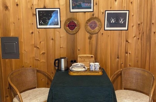 West Glacier Cabaña | Inside Glacier National Park, Walsh Cottage on the shores of Lake McDonald
