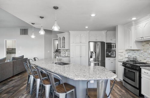 Visalia Villa | Inspired by the iconic white buildings and turquoise waters of Greece.