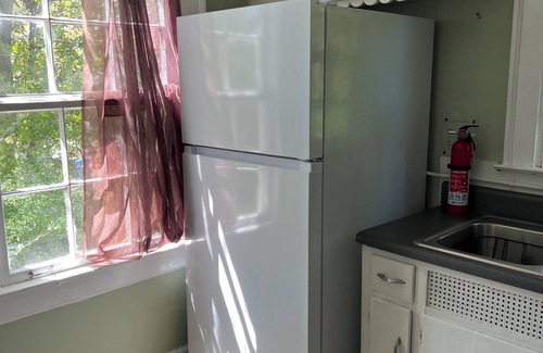 Edgewood Cabaña | intown escape small cottage on half acre garden walk to edgewood shopping
