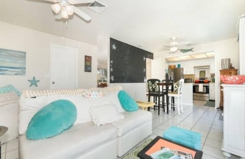 Oakland Hills Casa | Introducing Caddy Shack,the perfect abode for your short-term stay. This delightful 2 bed, 2 bath canal home has been thoughtfully remodeled to exude a beachy atmosphere
